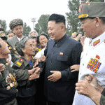 Kim Jong Un Has Photo Session with War Veterans and Commanding Officers