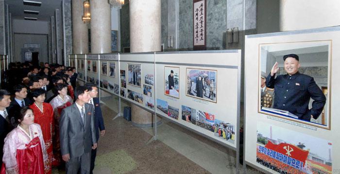 Displayed at the show hall are photos of Kim Jong Un, who is glorifying the party and state of the DPRK as glorious party and state of President Kim Il Sung and leader Kim Jong Il and demonstrating the independent dignity and power of Songun Korea.