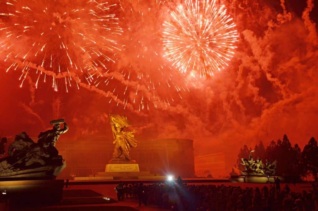 Fireworks explode before the 'Victorious Fatherland War Museum'